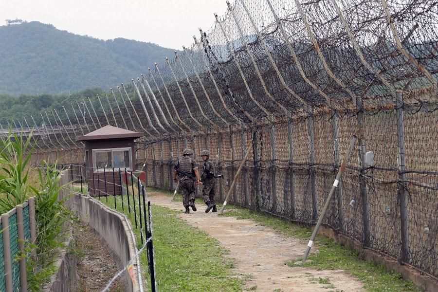 Колючая проволока и сигнализация на границе между Кореями